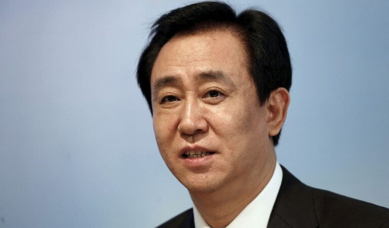 Pressure piles on Evergrande with chairman under police watch, liquidation risk